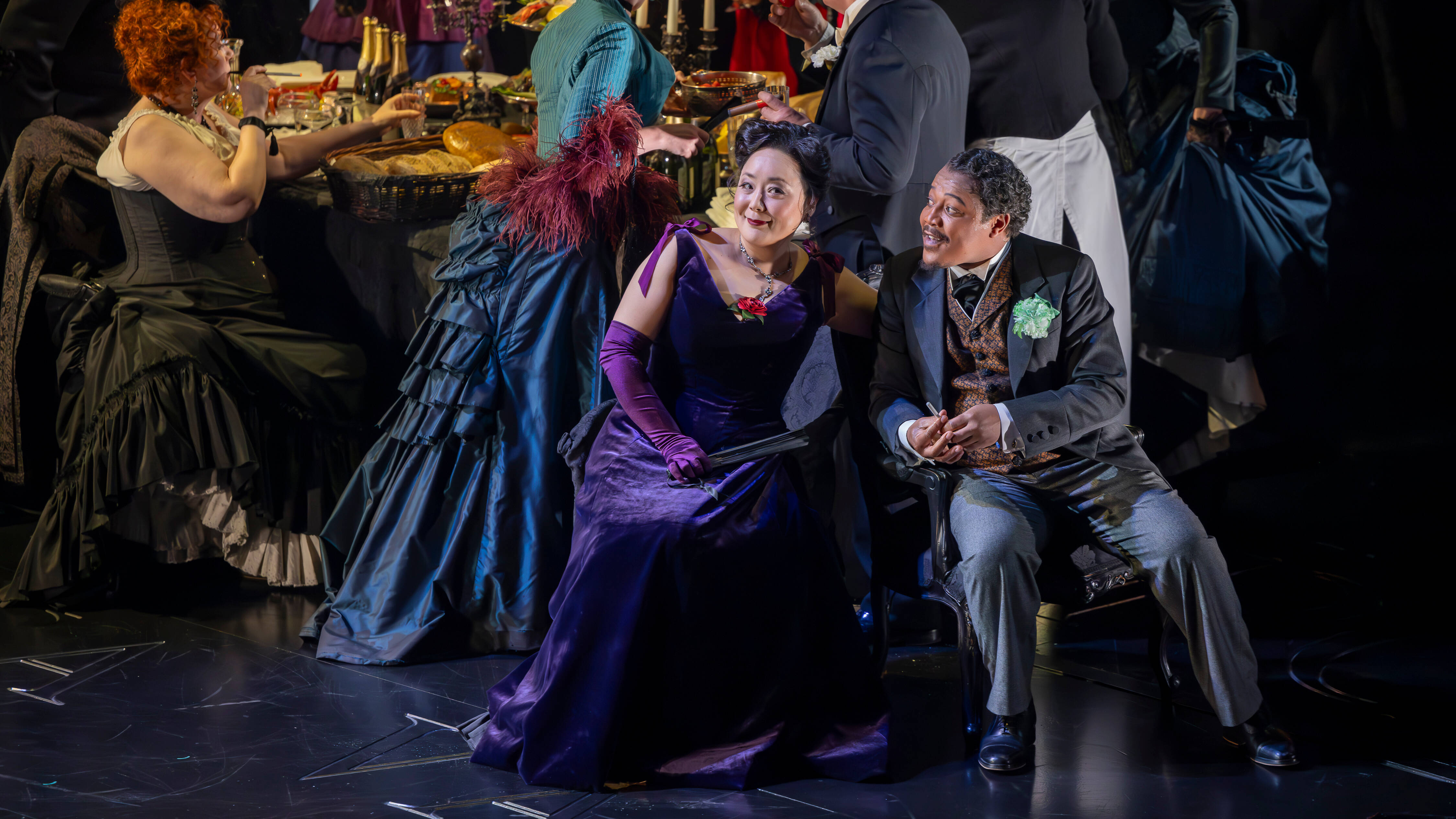 Hye Youn Lee (Violetta Valéry) and Monwabisi Lindi (Gastone) in La traviata. Scottish Opera 2024. Credit James Glossop.