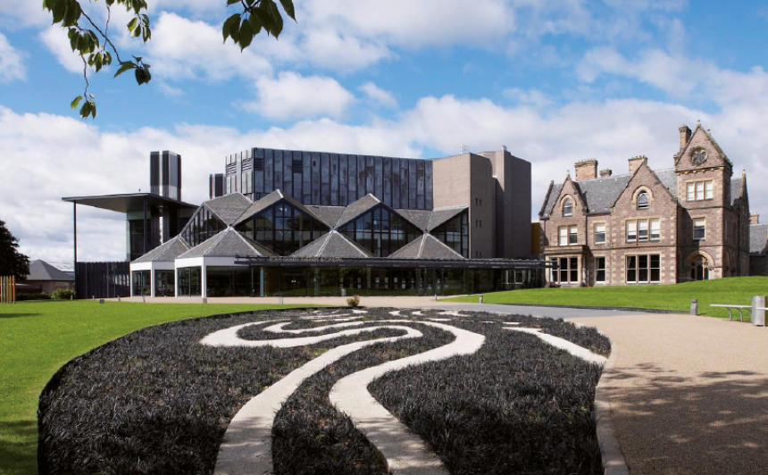 Eden Court Theatre and Cinema from the front lawn on a bright, sunny day