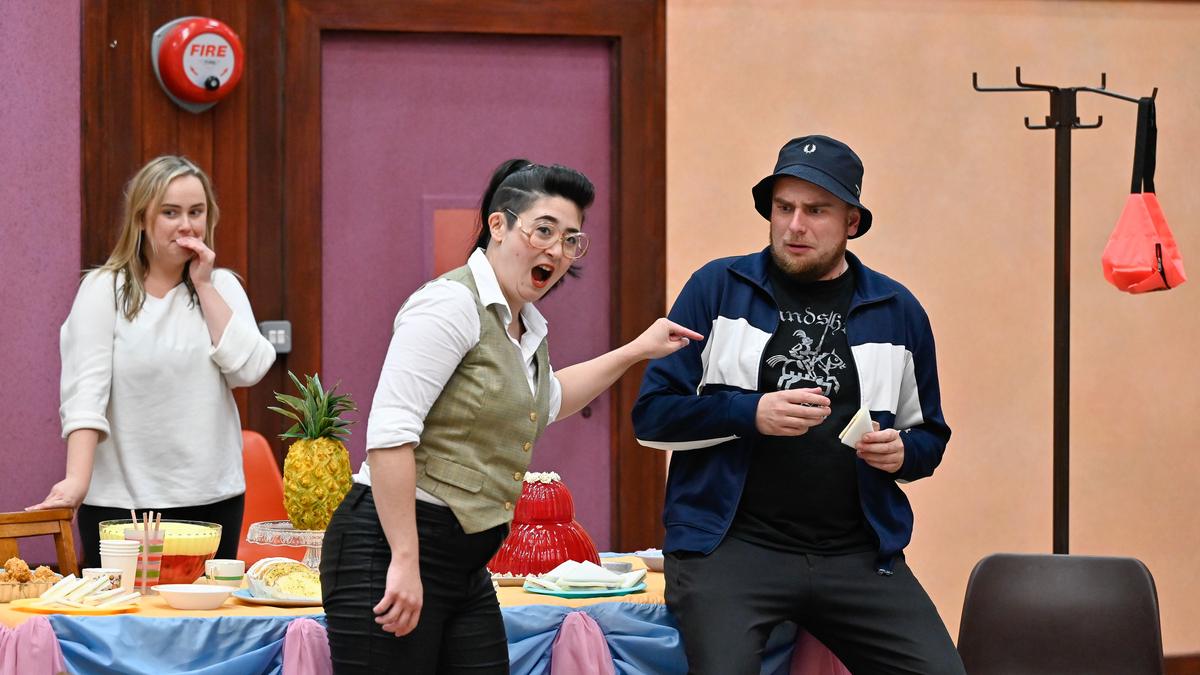 (L To R) Chloe Harris (Nancy), Jane Monari (Florence Pike), and Ross Cumming (Sid) in rehearsals for Albert Herring. Scottish Opera 2024. Credit Julie Howden..